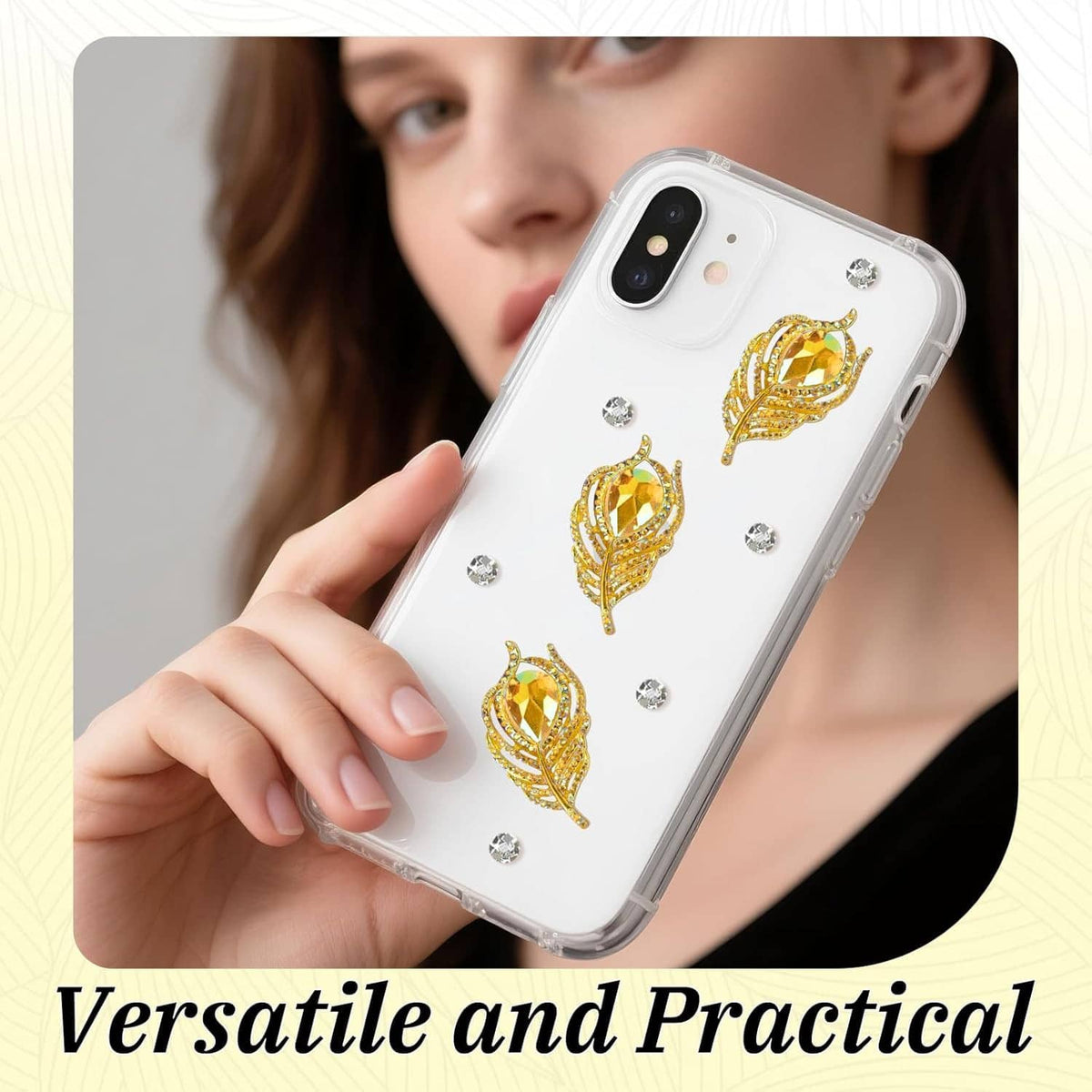 Clear phone case decorated with gold rhinestone feather flatback embellishments