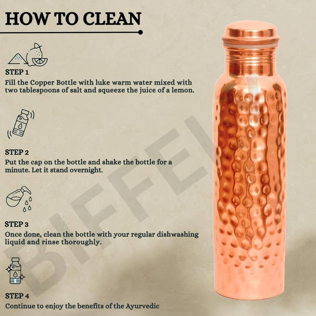 Copper water bottle with hammered texture and screw-top cap, shown standing.