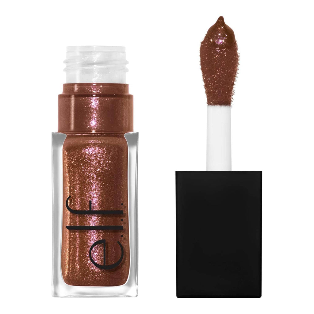 Bronze glitter lip oil in clear bottle with doe-foot applicator and black cap