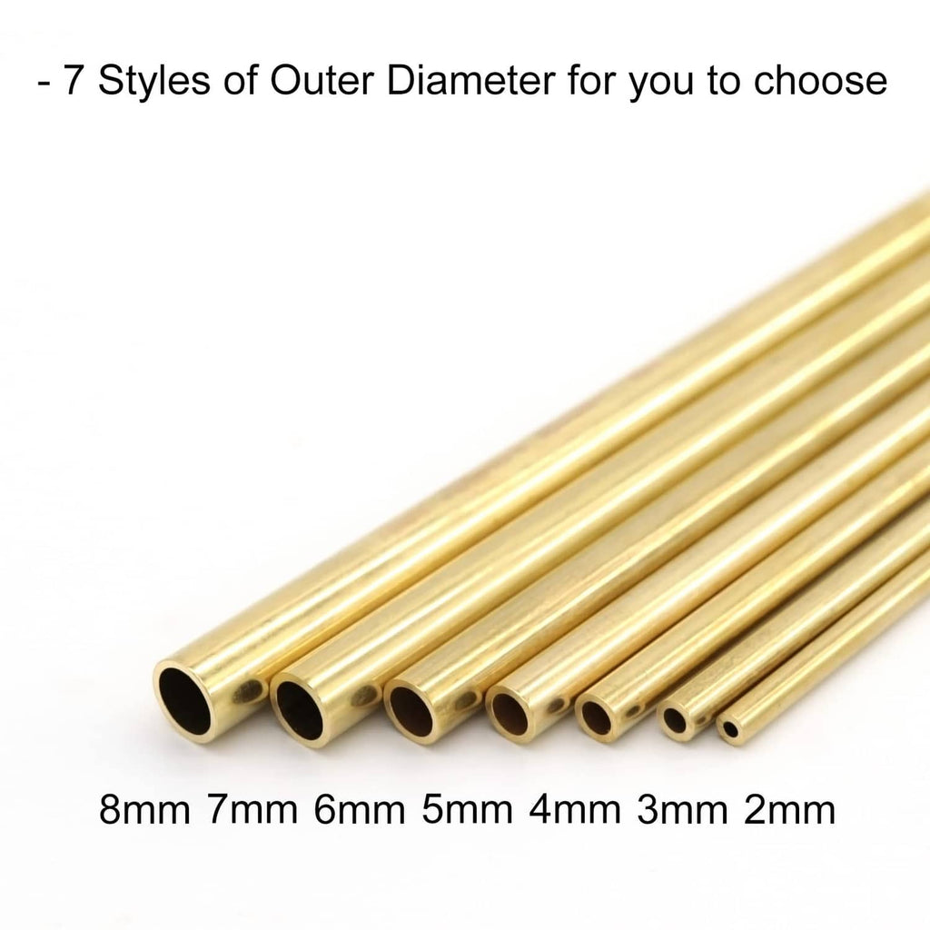 Gold brass round tubes set with varying diameters, multiple open ends