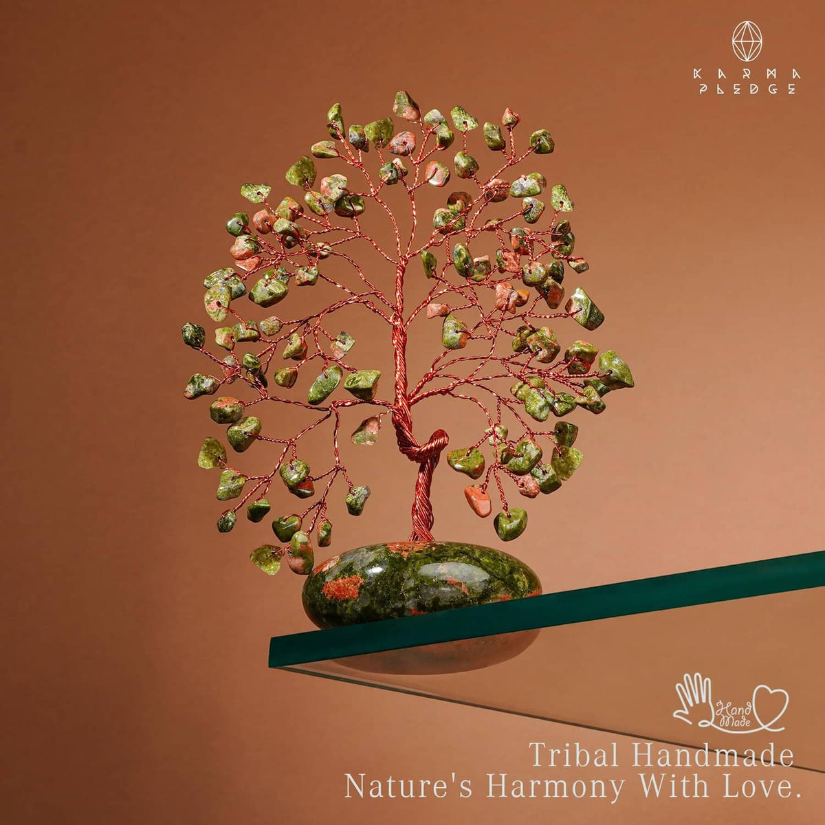 Unakite stone tree ornament with red wire branches and green-orange speckled base