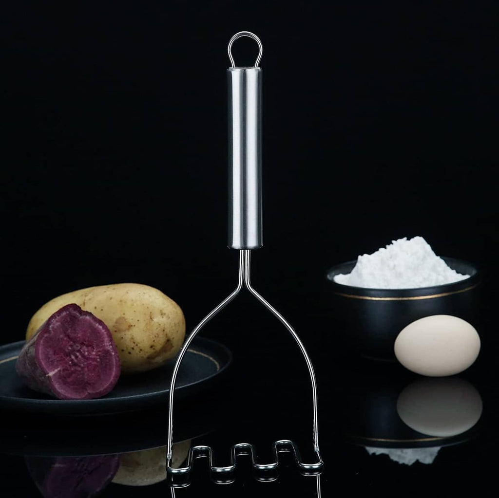 Stainless steel potato masher with upright handle and curved forked head