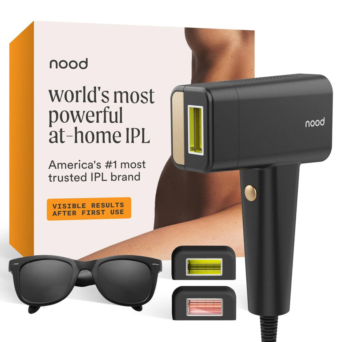 Matte black IPL device with included eyewear and filter cartridges in product box