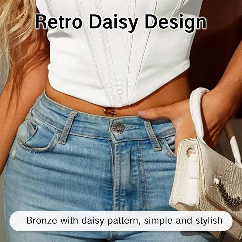 Bronze daisy snap button on light blue jeans waistband