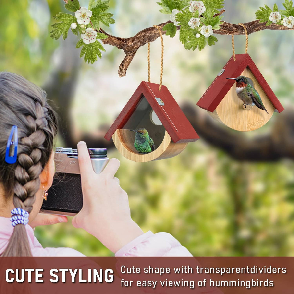 Two red wooden hummingbird bird houses with circular viewing windows, hanging