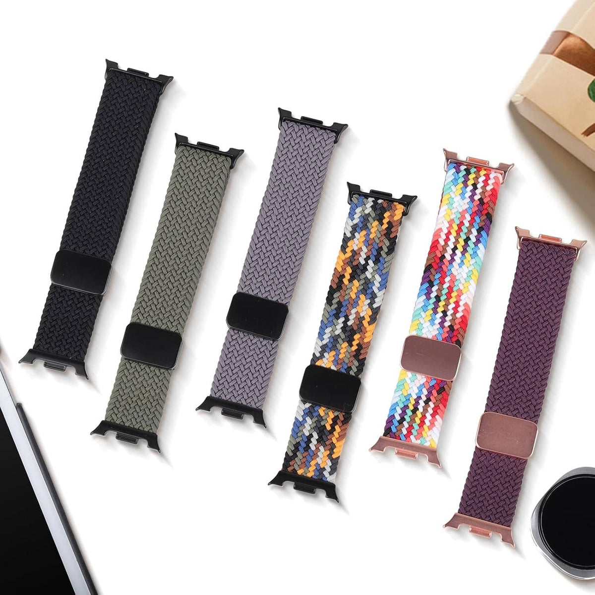 Braided magnetic watch bands in multiple colors, including black and multicolor