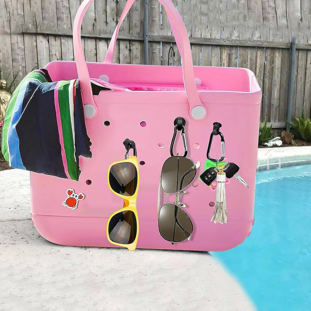 Pink tote bag organizer with hanging hooks and key holder clips for small accessories