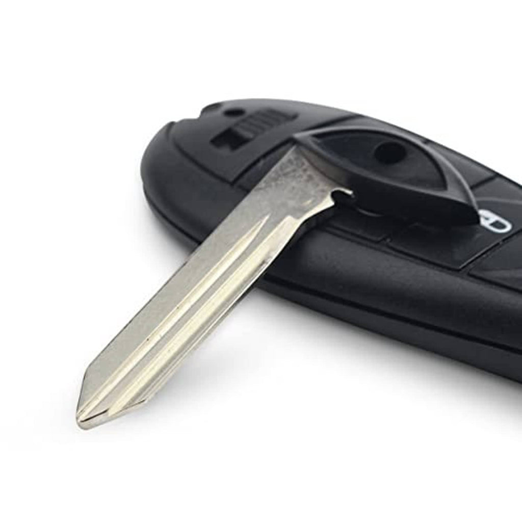 Black key fob shell case with inserted metal key blade, close-up