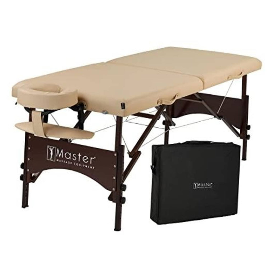 Portable massage table, cream padded surface with headrest, armrests, walnut legs, carry bag