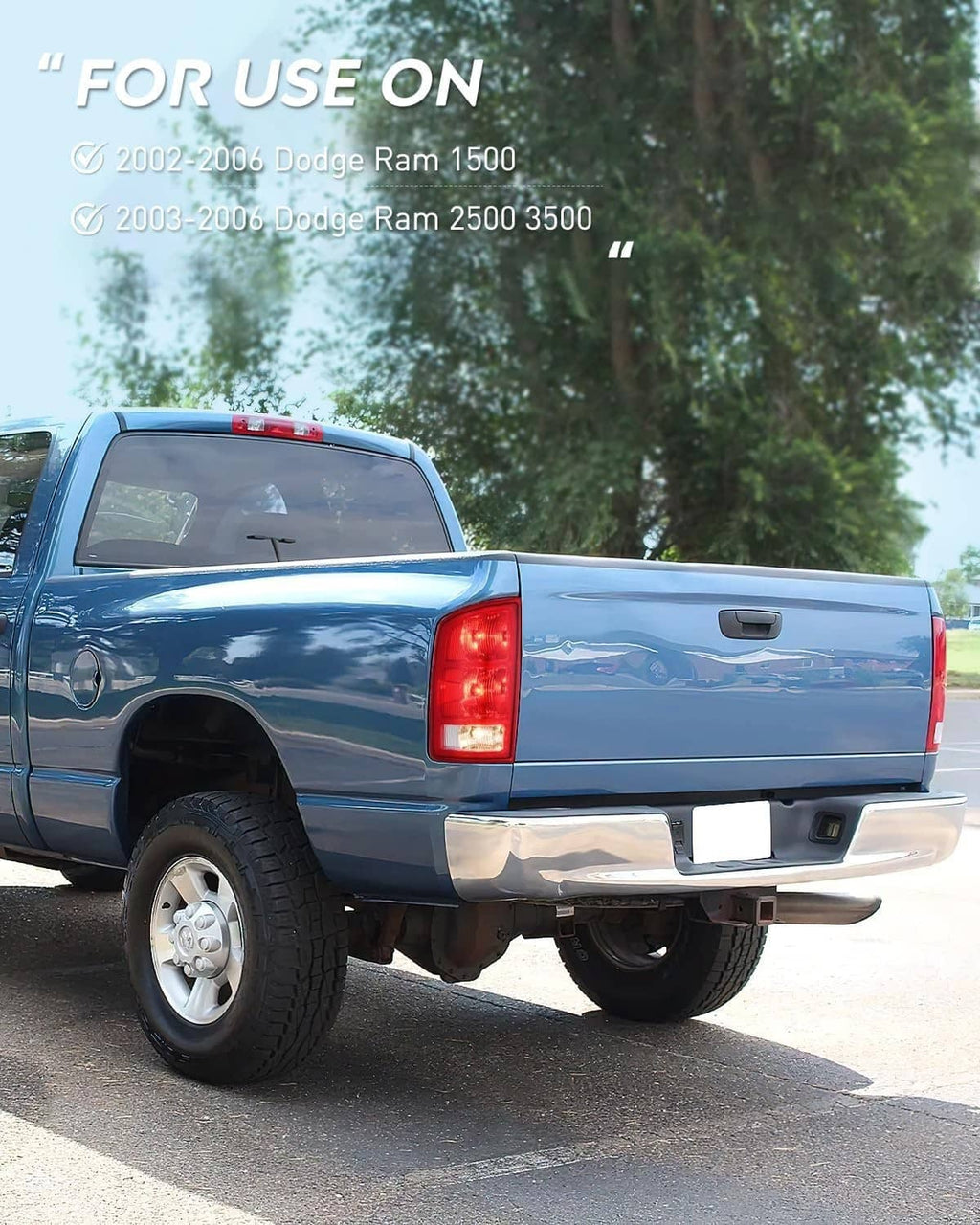 Blue pickup truck rear with red tail lights and clear turn signal lenses