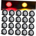 Round LED side marker lights with clear reflector, black housing; multiple units shown