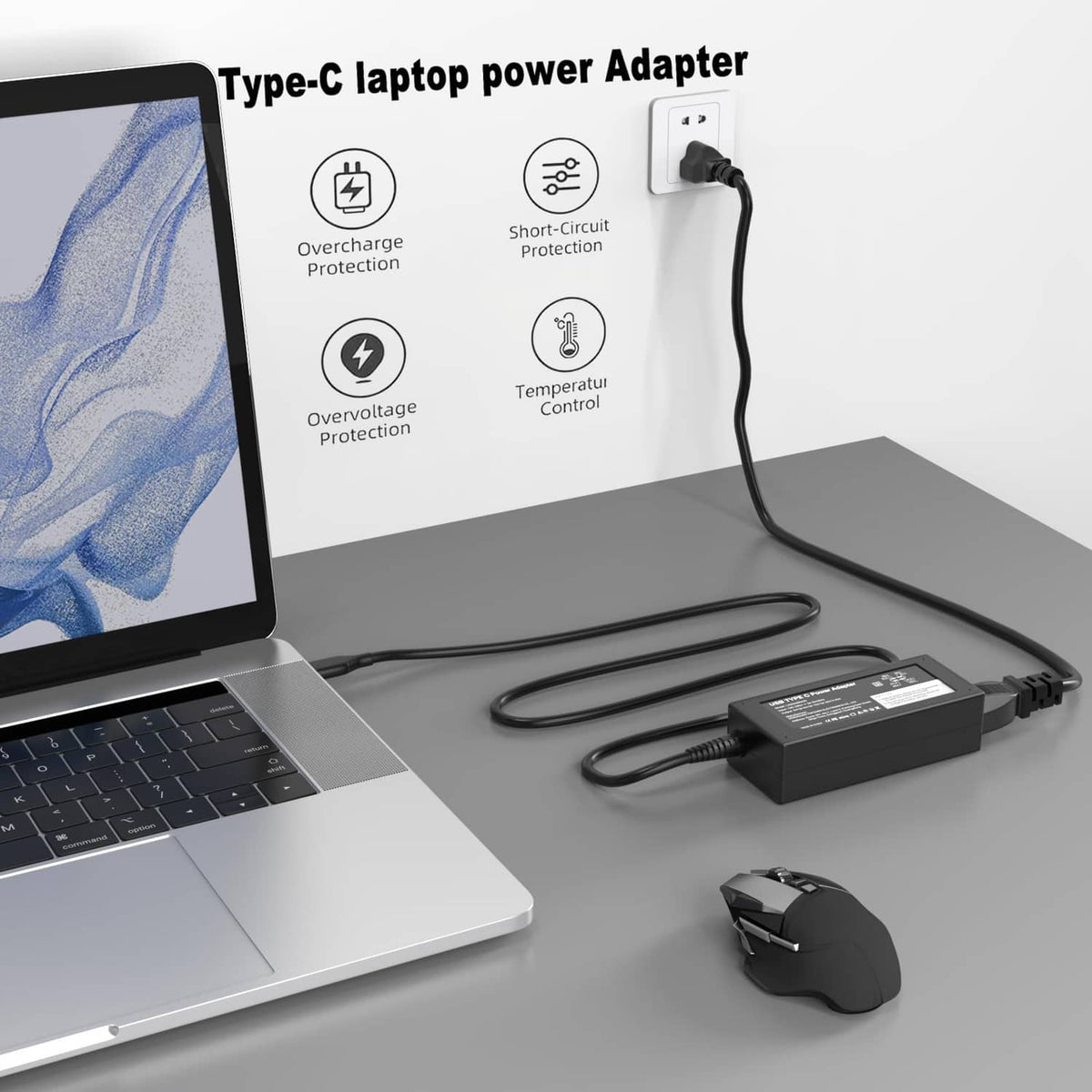 USB-C laptop power adapter with cable connected to a laptop on a desk