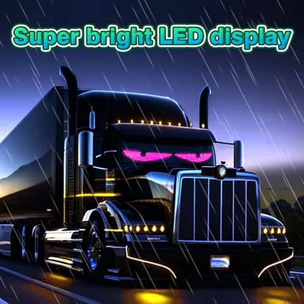 Truck with colorful LED devil eyes display lighting the front windshield