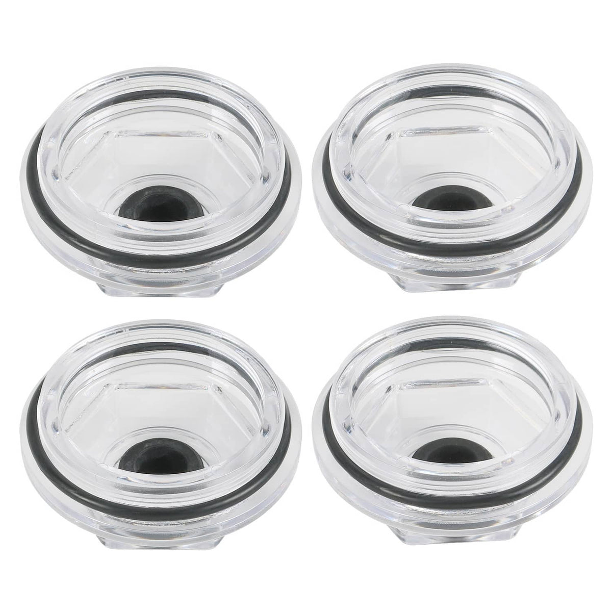 Four oil bath dust caps, top view, clear plastic bodies with black center inserts
