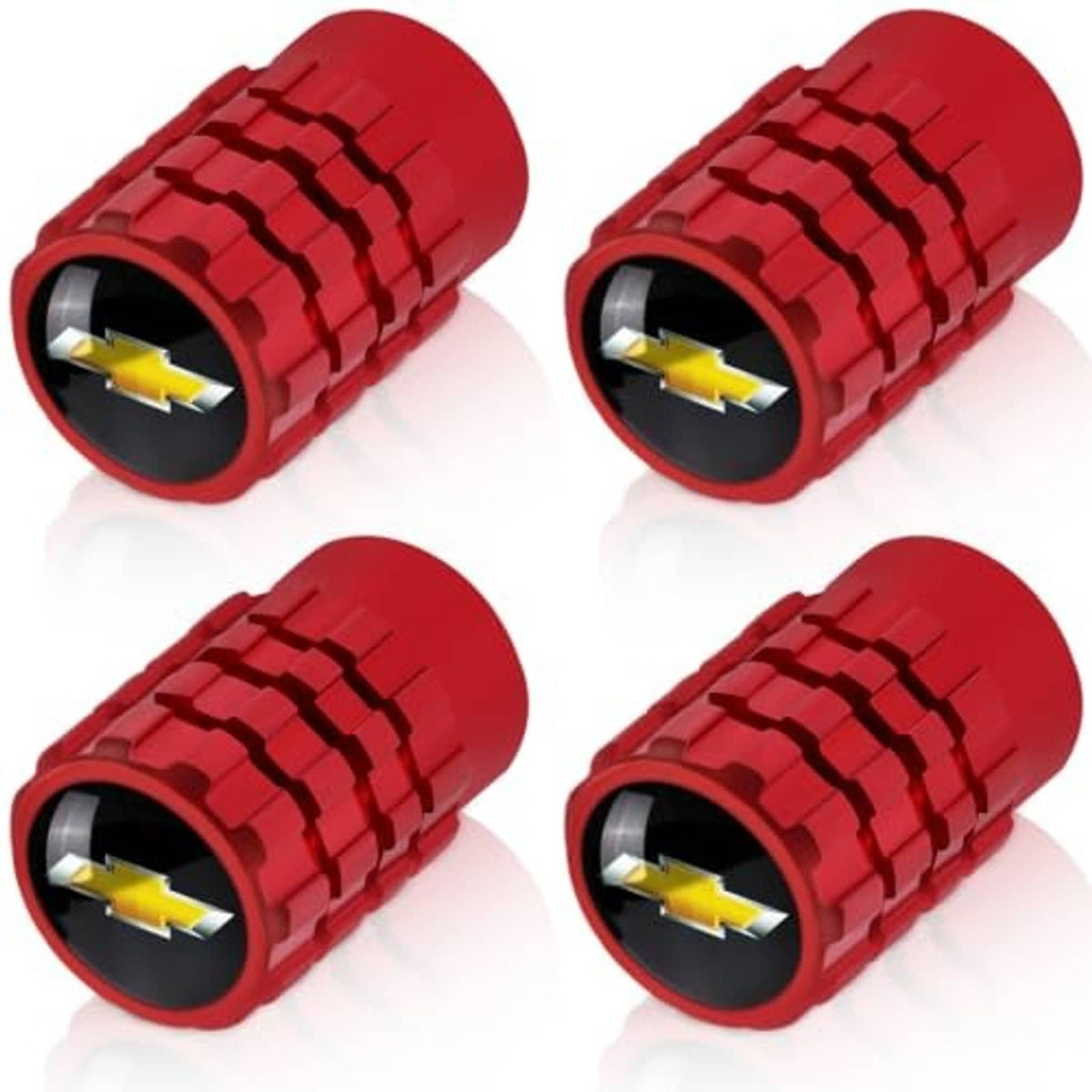Four red tire valve stem caps with yellow lightning marks and black openings