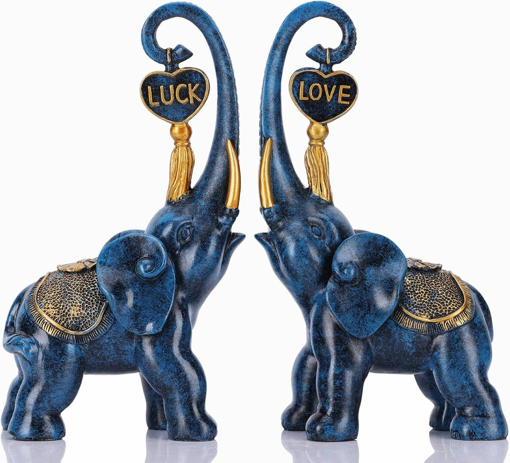 Pair of blue elephant statues with gold headpieces and Luck/Love plaques