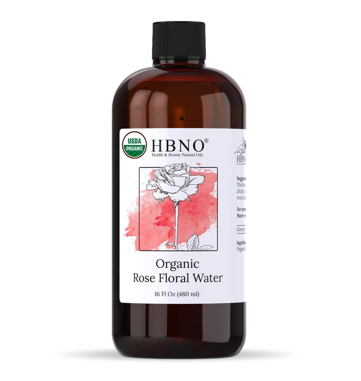 Amber glass bottle of organic rose floral water with black cap, 16 fl oz