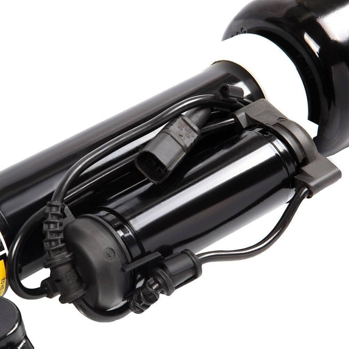 Black air strut with electrical wiring and protected compressor unit