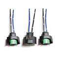 3-pack headlight bulb adapter plugs with green terminals, black housing, blue/black wires