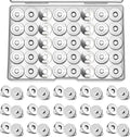 Magnetic snap fasteners set: round silver snap buttons and matching clips in a tray