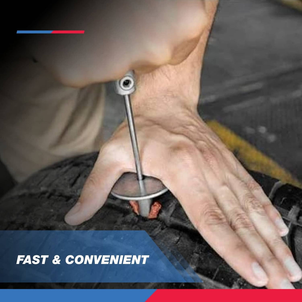 Hand using a tubeless tire plug insertion tool on a damaged tire tread