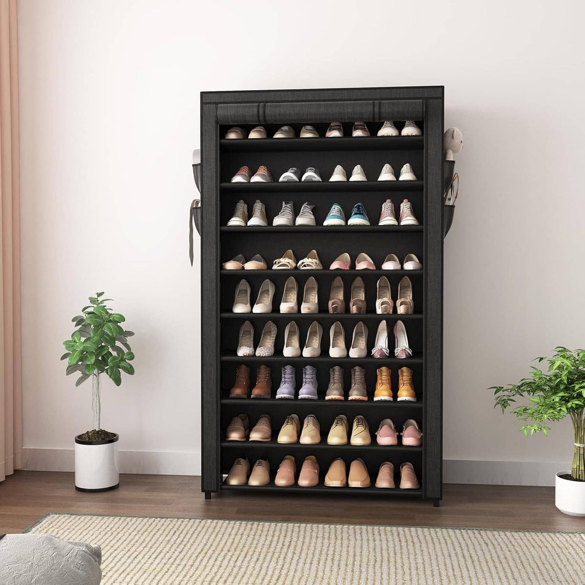 Tall black shoe rack with fabric cover, open shelves holding assorted shoes