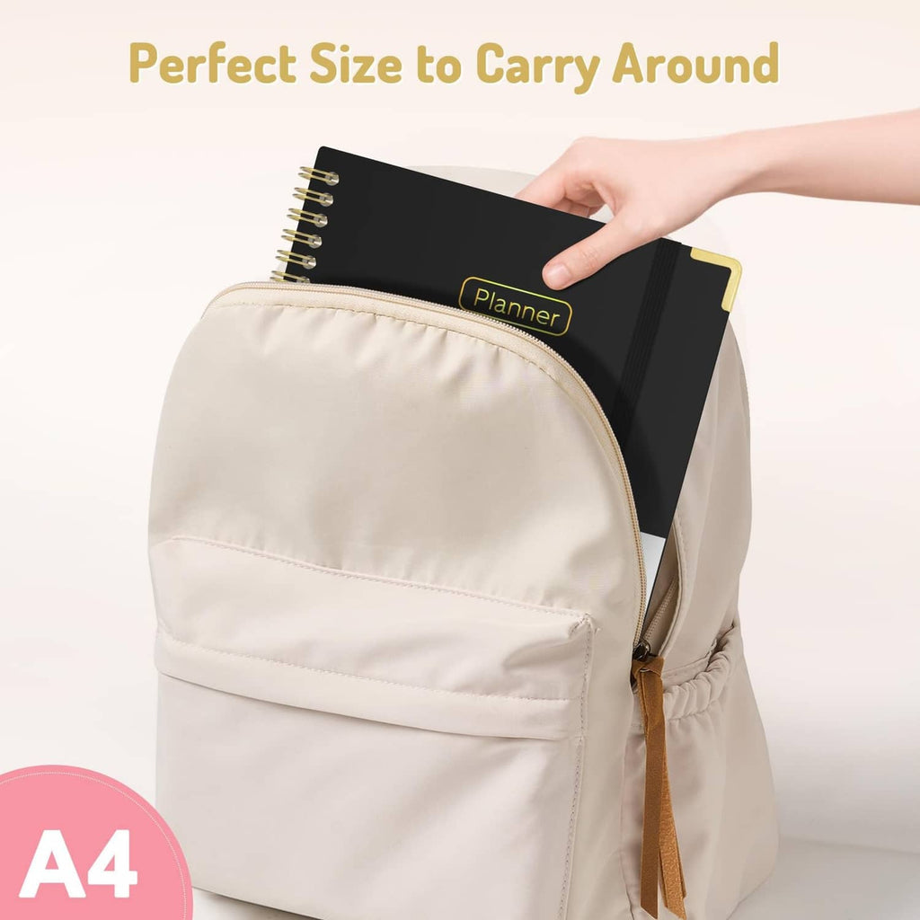 Planner fits in an A4 tote bag; black cover visible through the zip opening