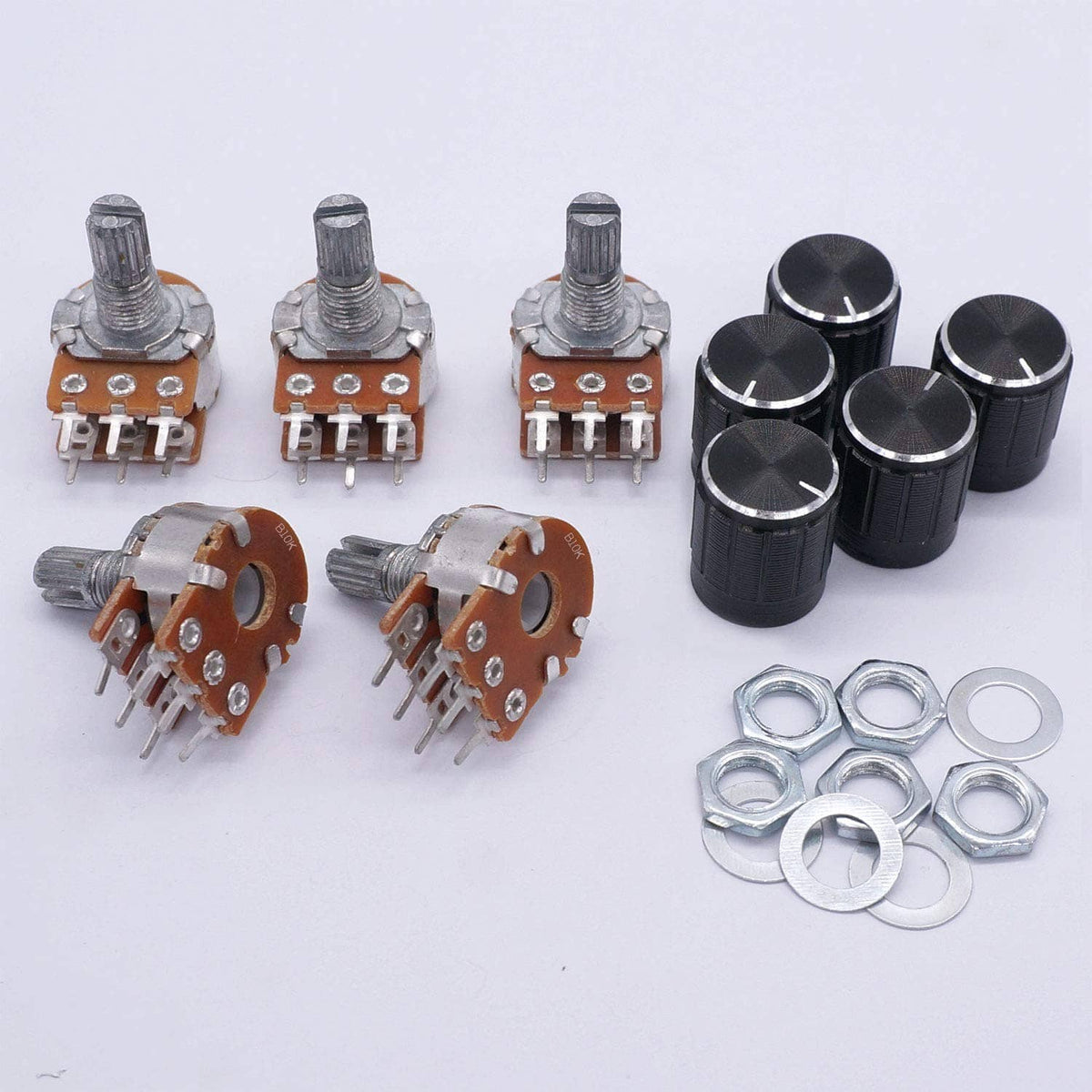 Potentiometers with metal shafts, orange mounting plates, black knobs, and washers