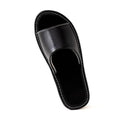 Black leather slide sandal with open toe and stitched strap, side view.