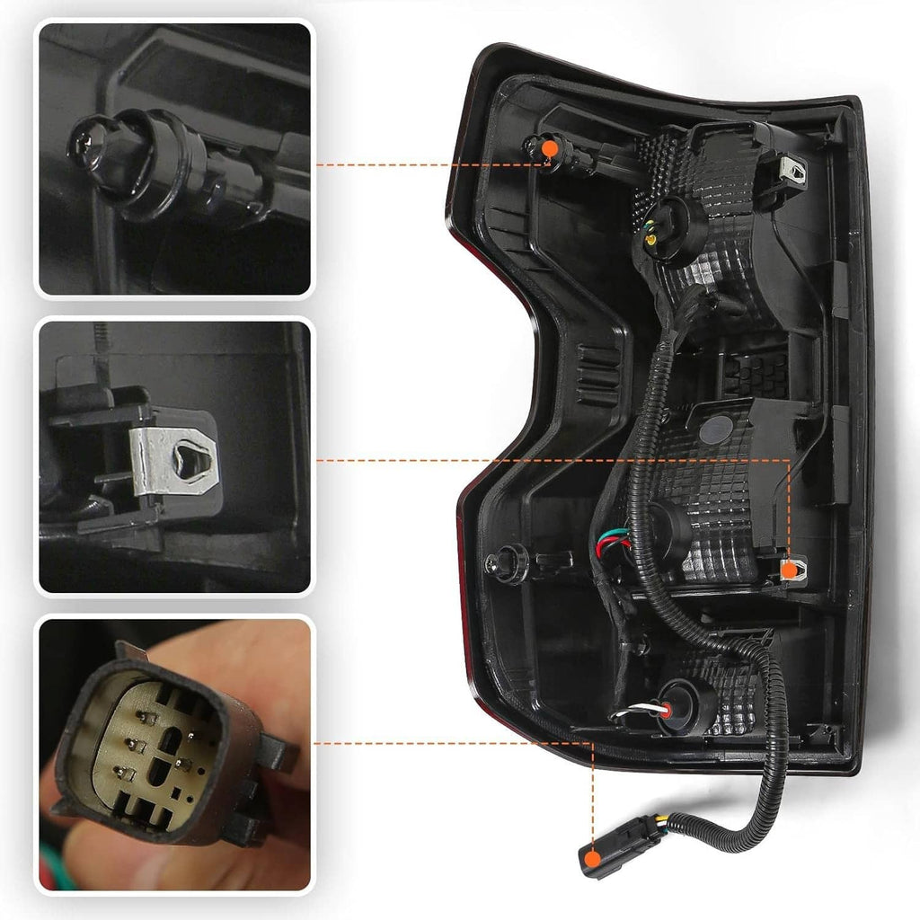 Back view of black tail light housing with wiring harness and connector sockets