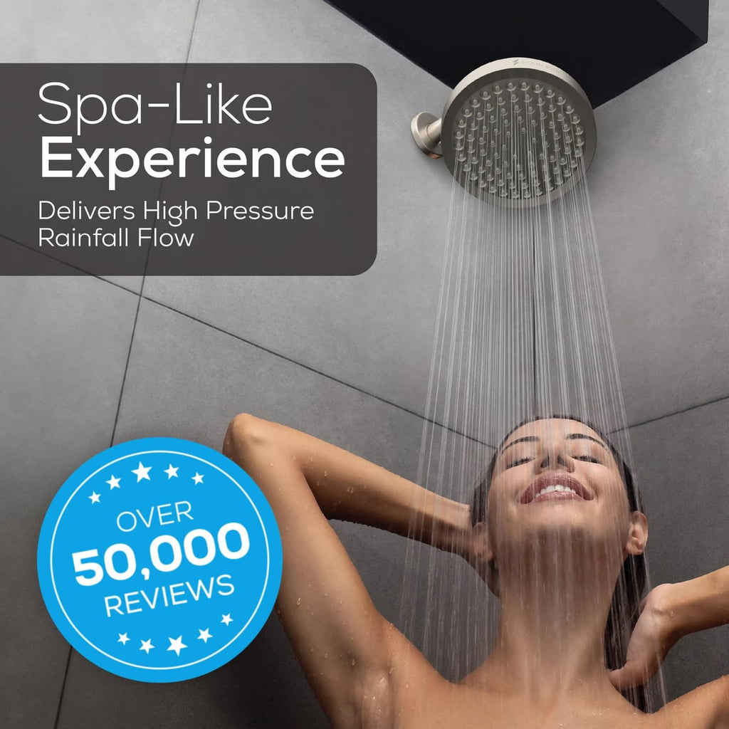 Overhead rain shower head delivering full-coverage waterfall spray for a spa-like flow
