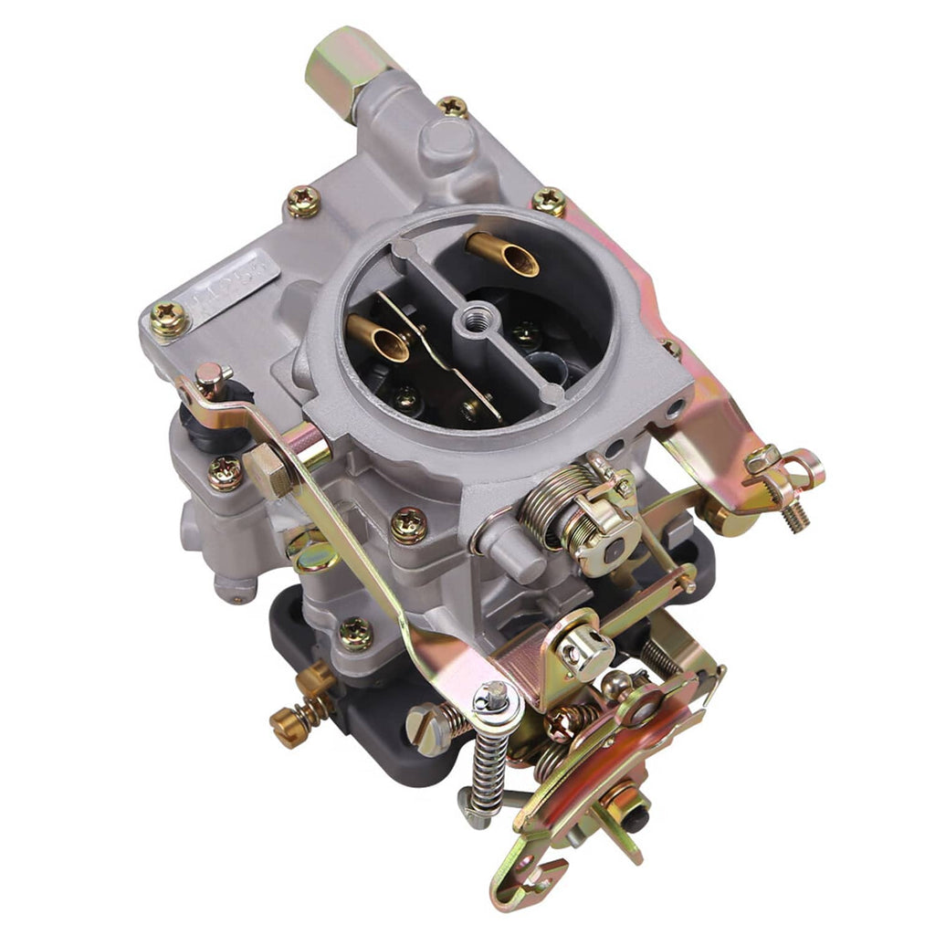 Carburetor top view showing air horn opening with gold interior and linkage components