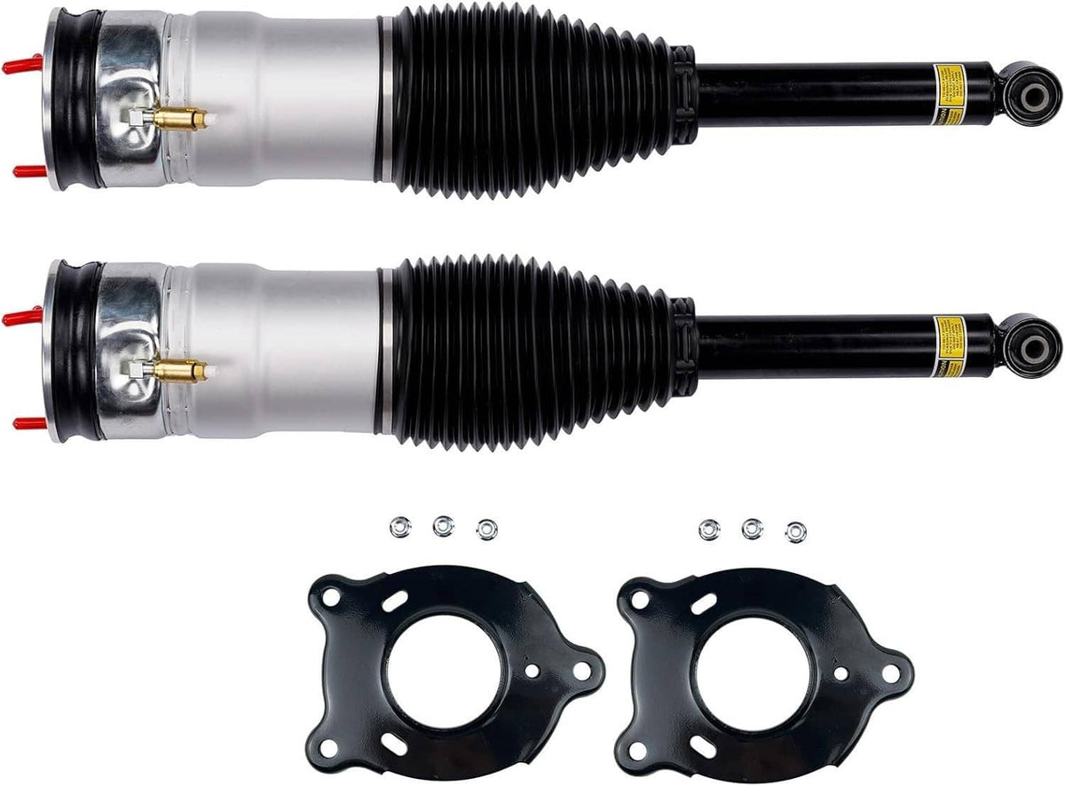 Rear air suspension strut pair with silver shock bodies, black boots, and two mounting brackets