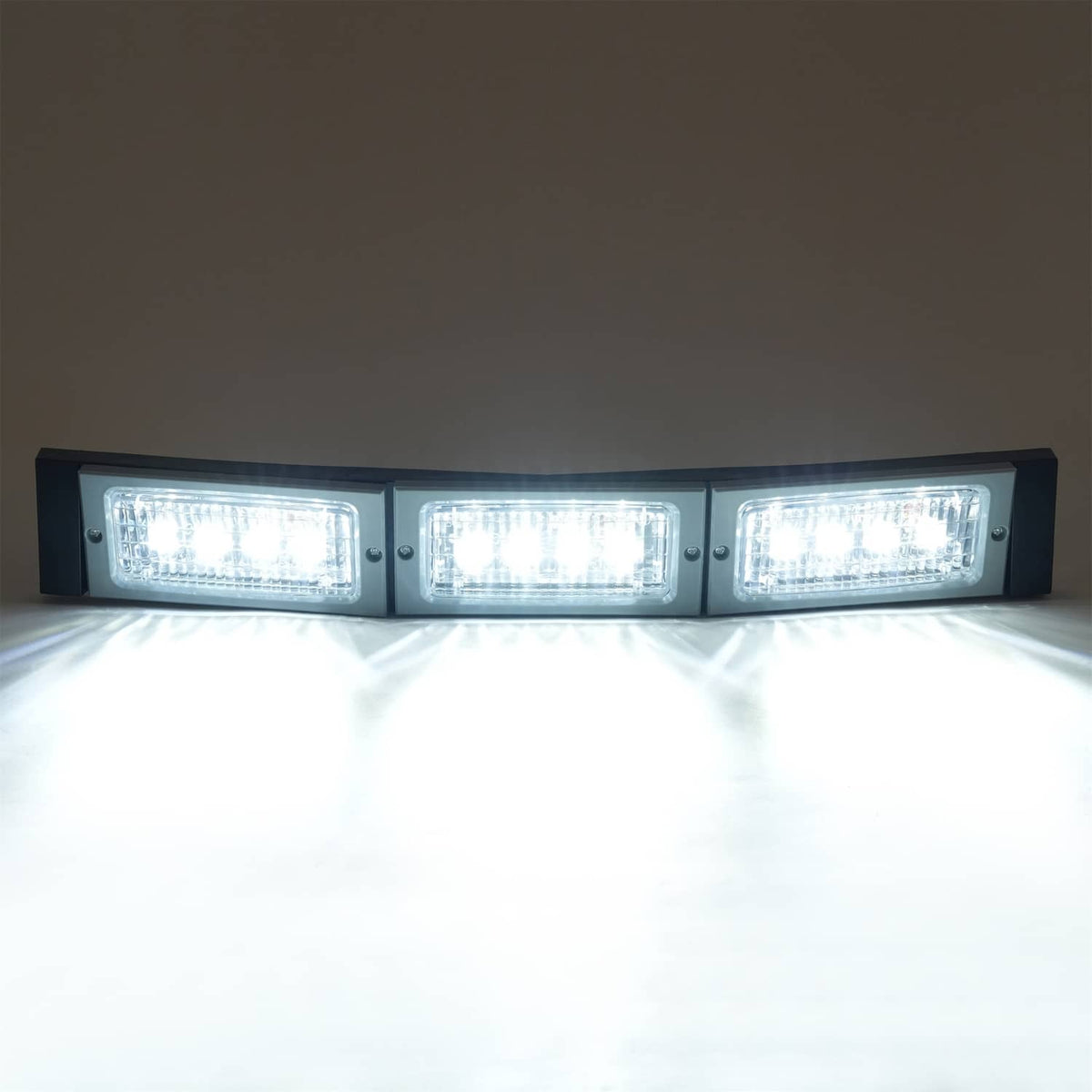 Front view of illuminated 3-LED headlight light bar with three rectangular lenses