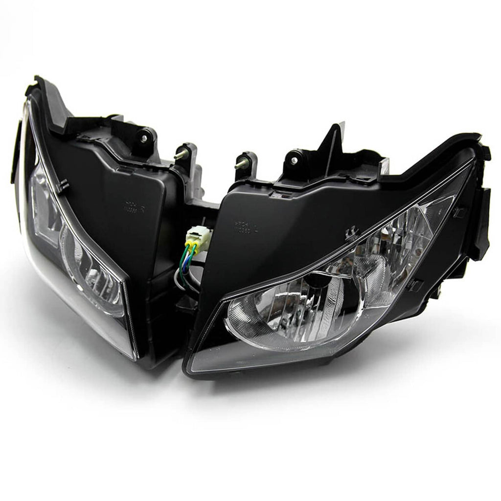 Front headlight assembly, black housings with clear lenses and visible electrical connectors