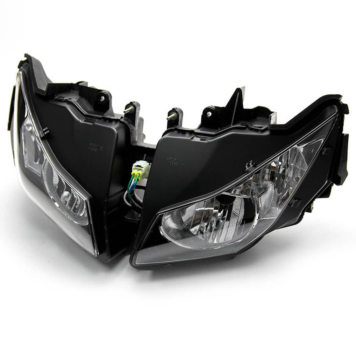 Front headlight assembly, black housings with clear lenses and visible electrical connectors
