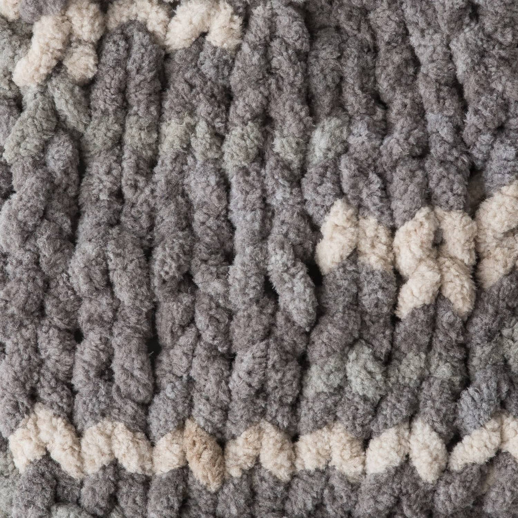 Thick chenille-style yarn loops in dark gray with cream stripe bands