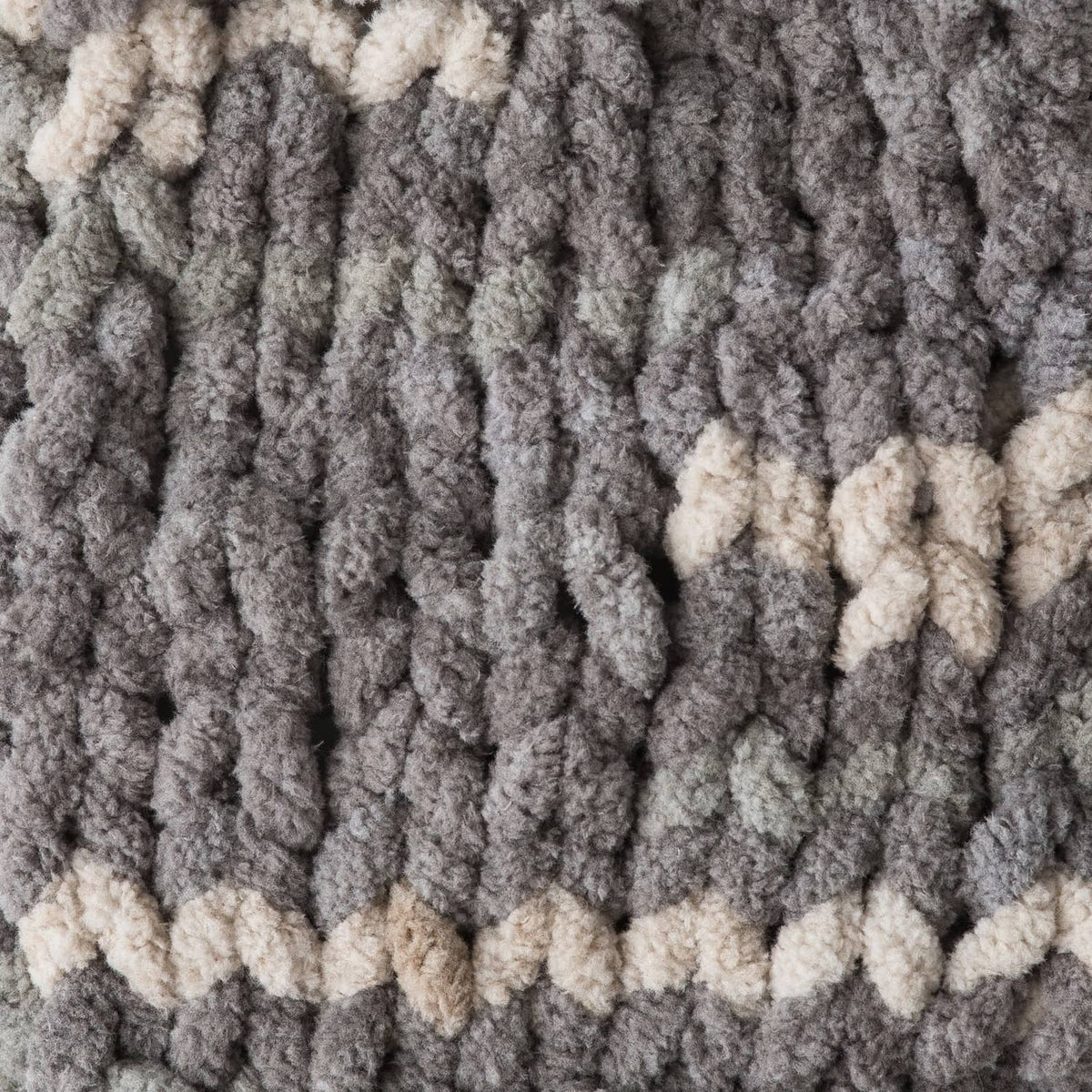 Thick chenille-style yarn loops in dark gray with cream stripe bands