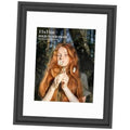 Black textured solid wood picture frame with white mat and tempered glass, front view