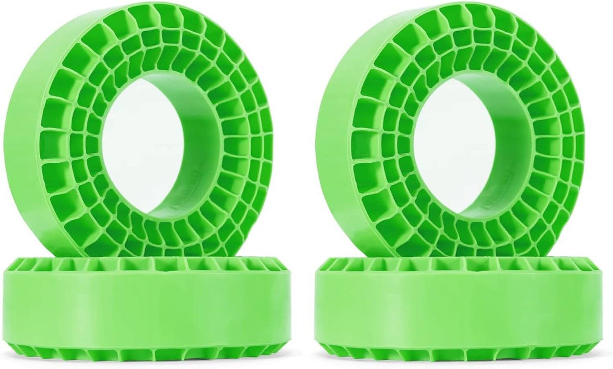 Green silicone rubber tire insert with honeycomb tread pattern and center hole