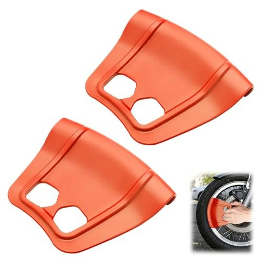 Two orange plastic rim protectors, curved shields with two oval handle cutouts
