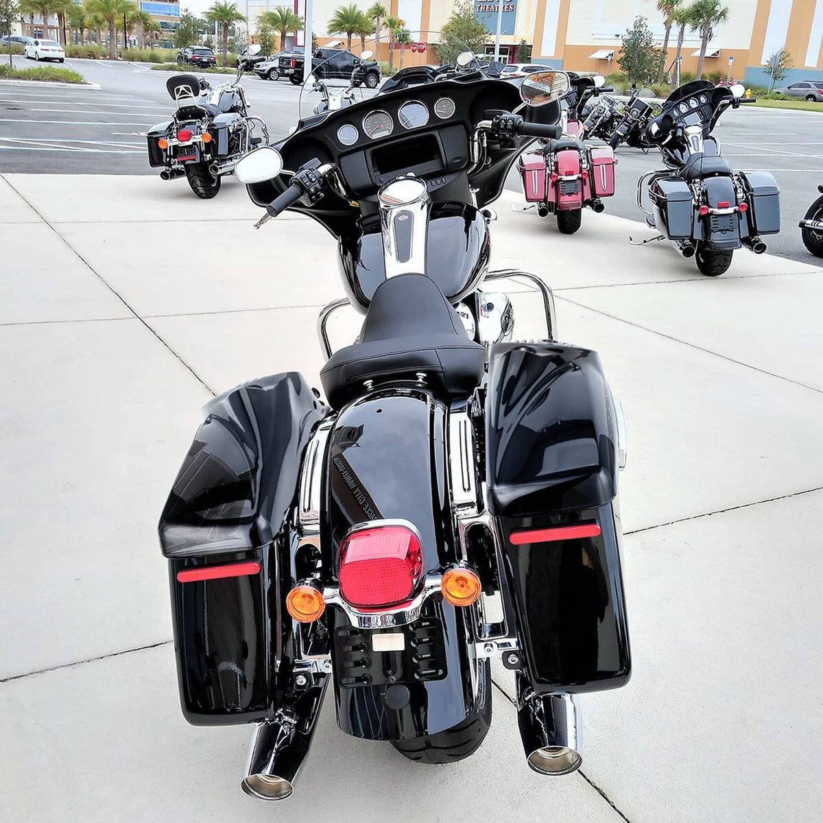 Motorcycle with black speaker lids and grille vents on front fairing and sides