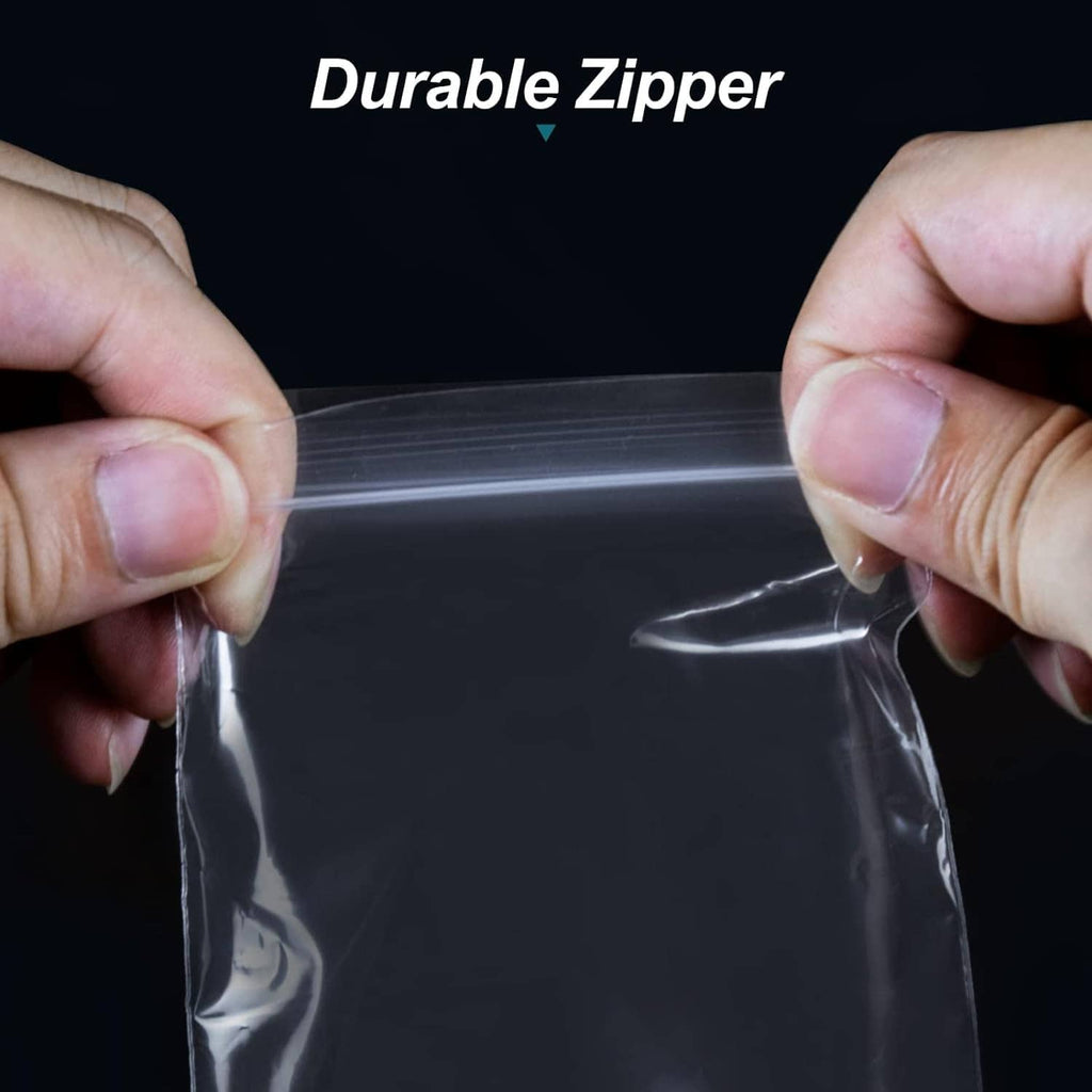 Clear mini plastic zip bag, shown being sealed between two hands