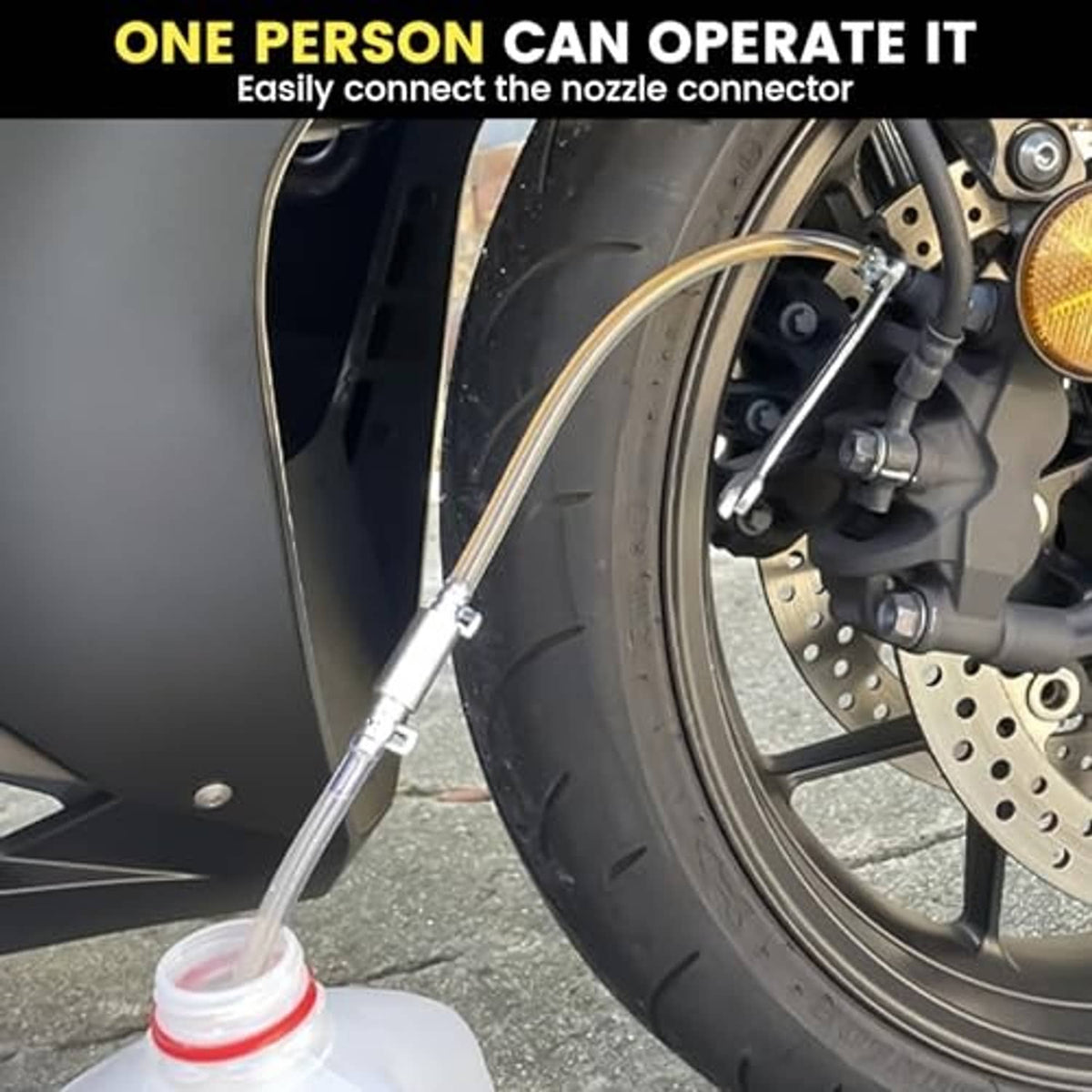 Brake bleeder hose connected near front wheel and brake caliper, clear line to reservoir