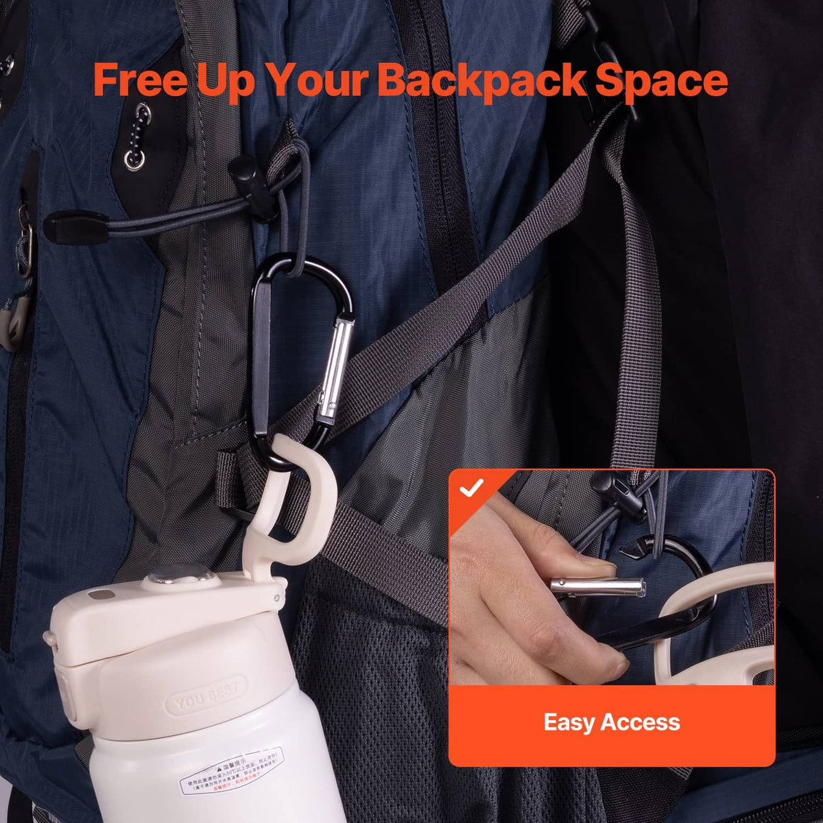 Black spring clip carabiner keyring attached to a backpack strap for carrying.
