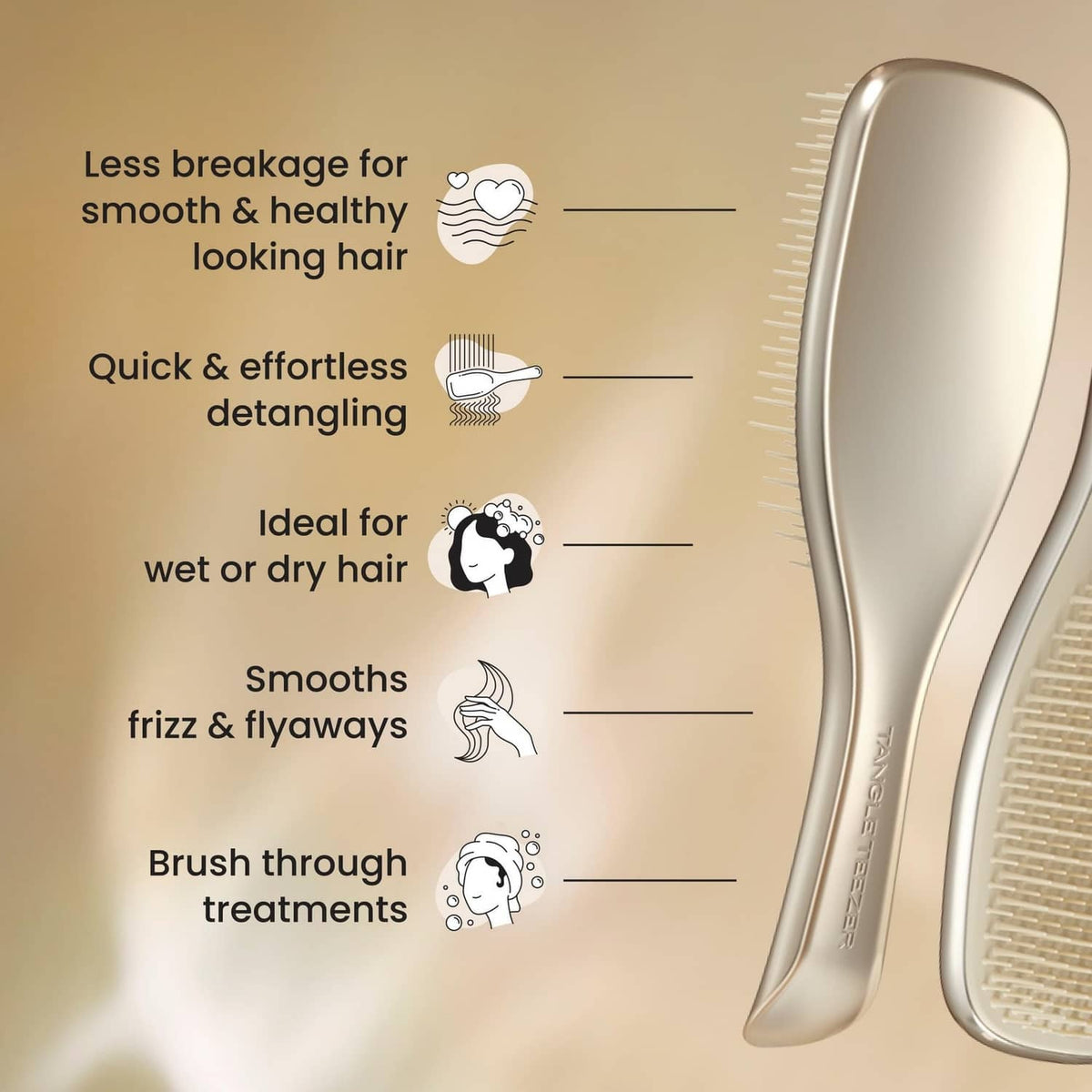 Champagne gold detangling hairbrush with arched handle and fine bristle teeth