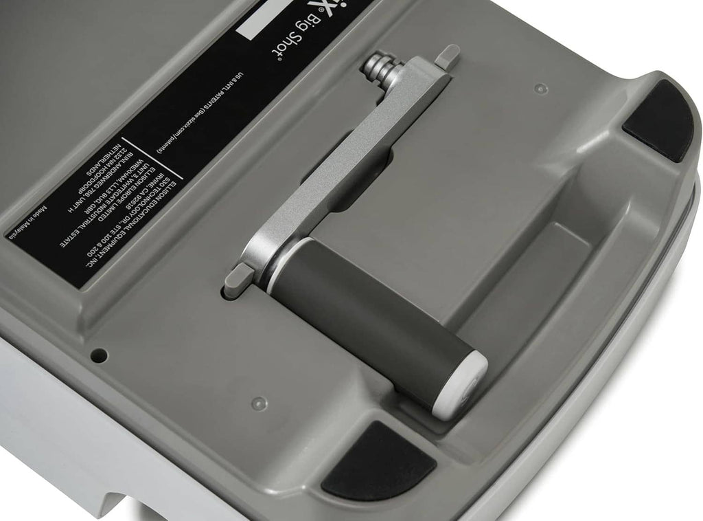 Close-up of Sizzix Big Shot metal plate and gray feed roller