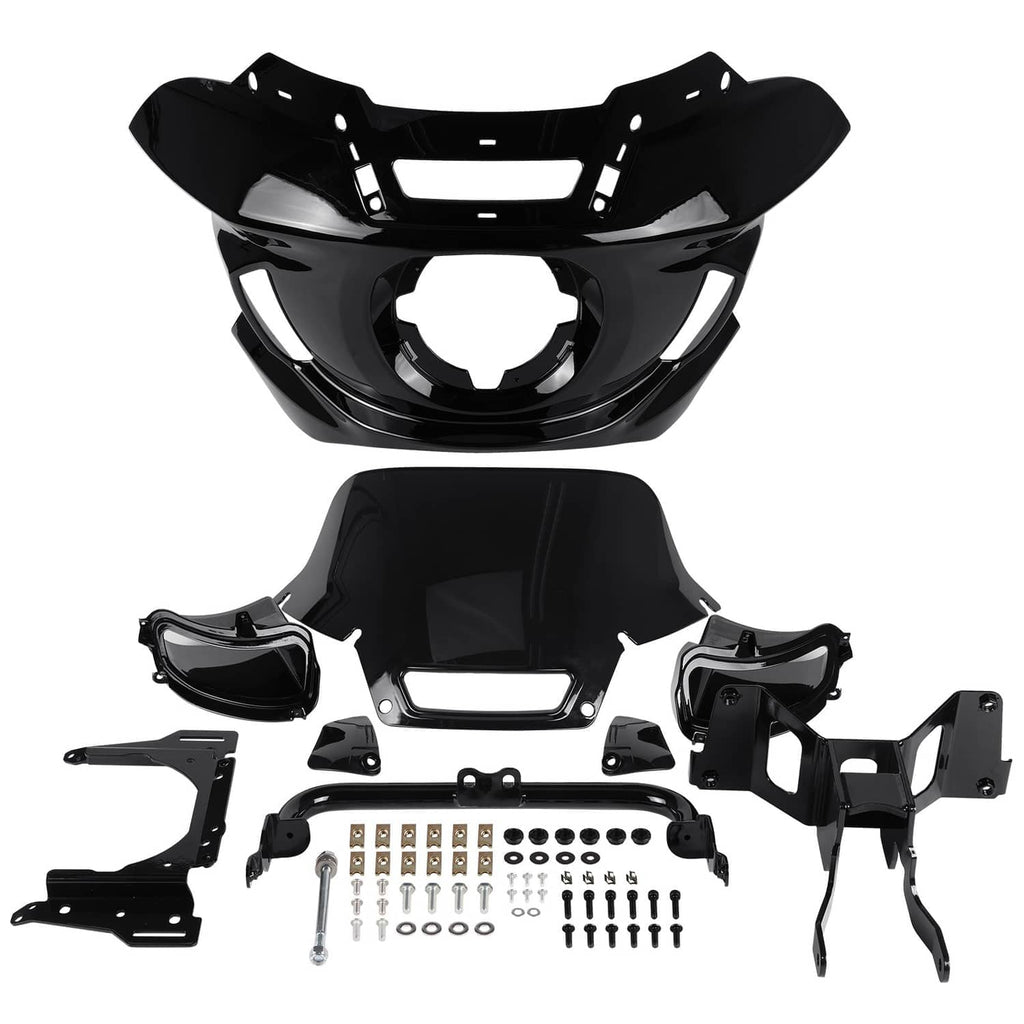 Black headlight fairing and windshield bracket kit laid out with bolts and screws