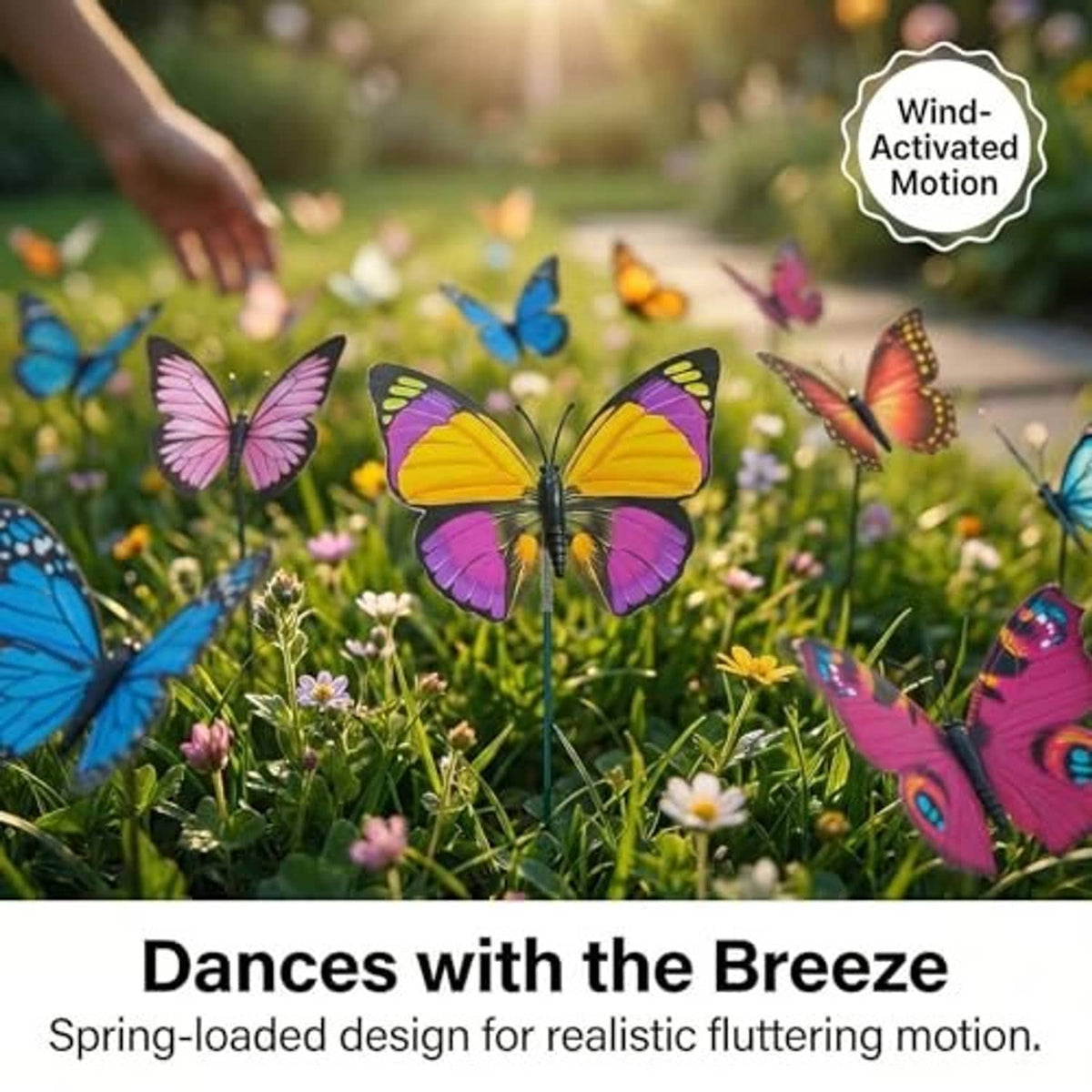 Colorful butterfly garden stakes on flowers and grass with visible multicolored wings