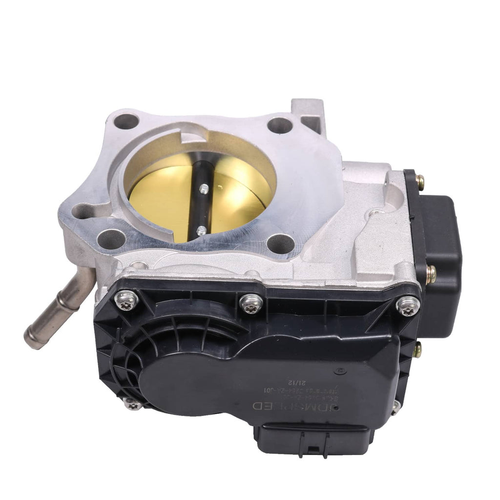 Electronic throttle body rear view with silver housing, gold bore, and black mounting section